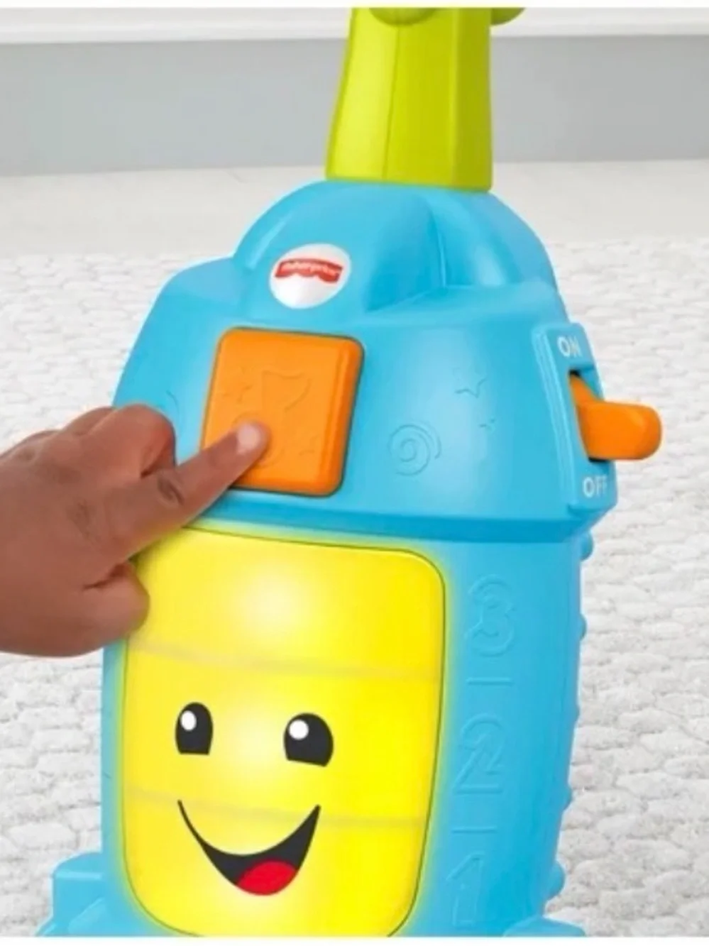 Fisher-Price Blue and Green Musical Push Vacuum Toy